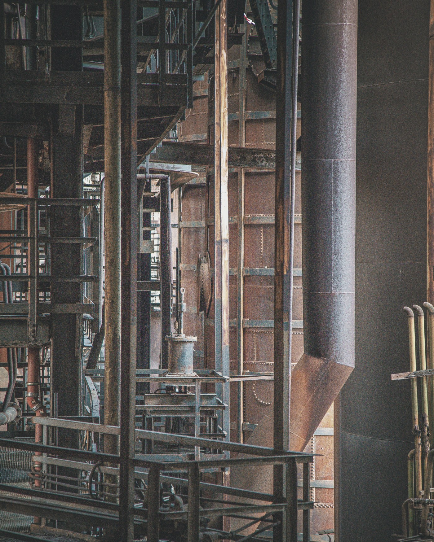 Rusted industrial infrastructure, pipes and structural steel